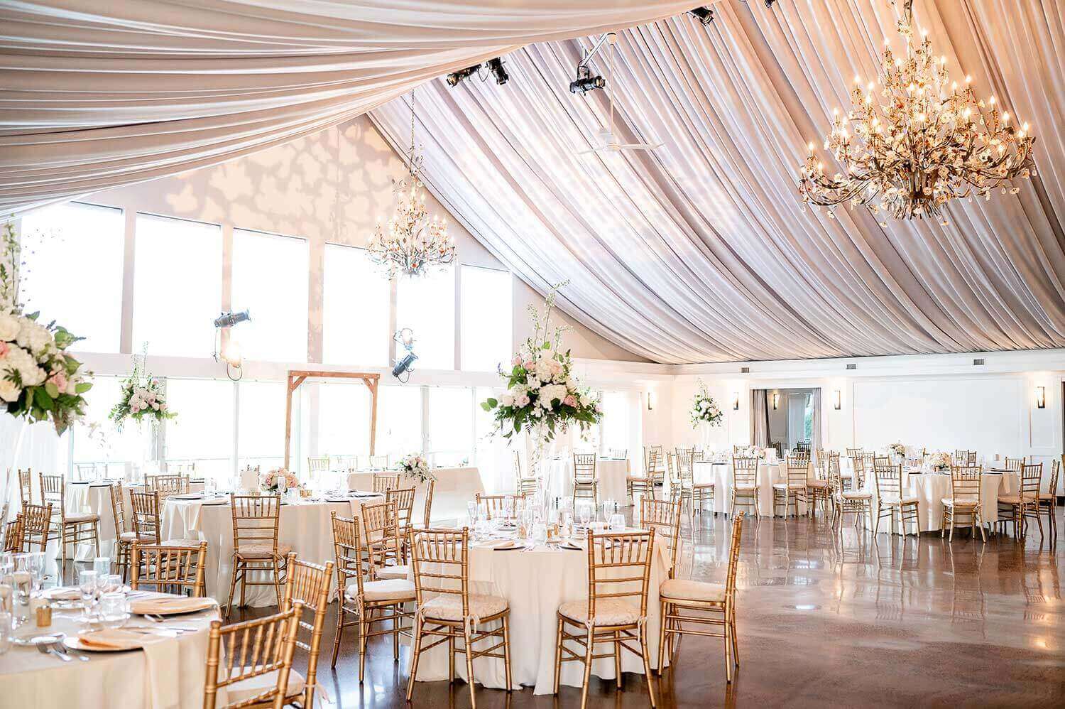 The Lake House Inn's beautifully appointed reception space with endless dancefloor and draped ceiling.